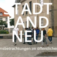 On display is a graphic that reads "Stadt.Land.Neu. Audience observations in public space". Behind the writing you can see people in public space.