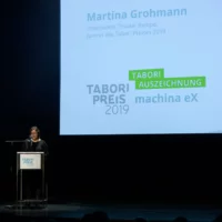 Martina Grohmann reading the jury statement for the winners of machina eX.
